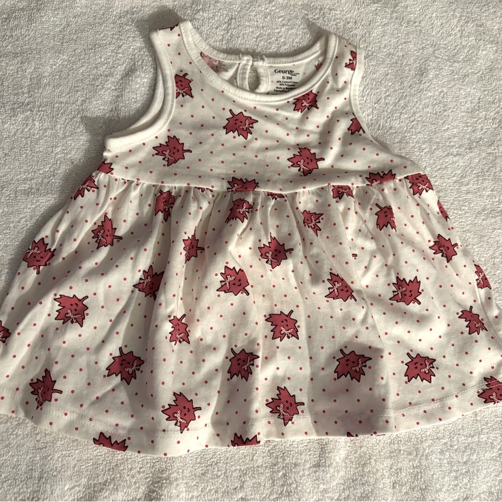 New white dress with red maple leaf patterns size 0-3 mths